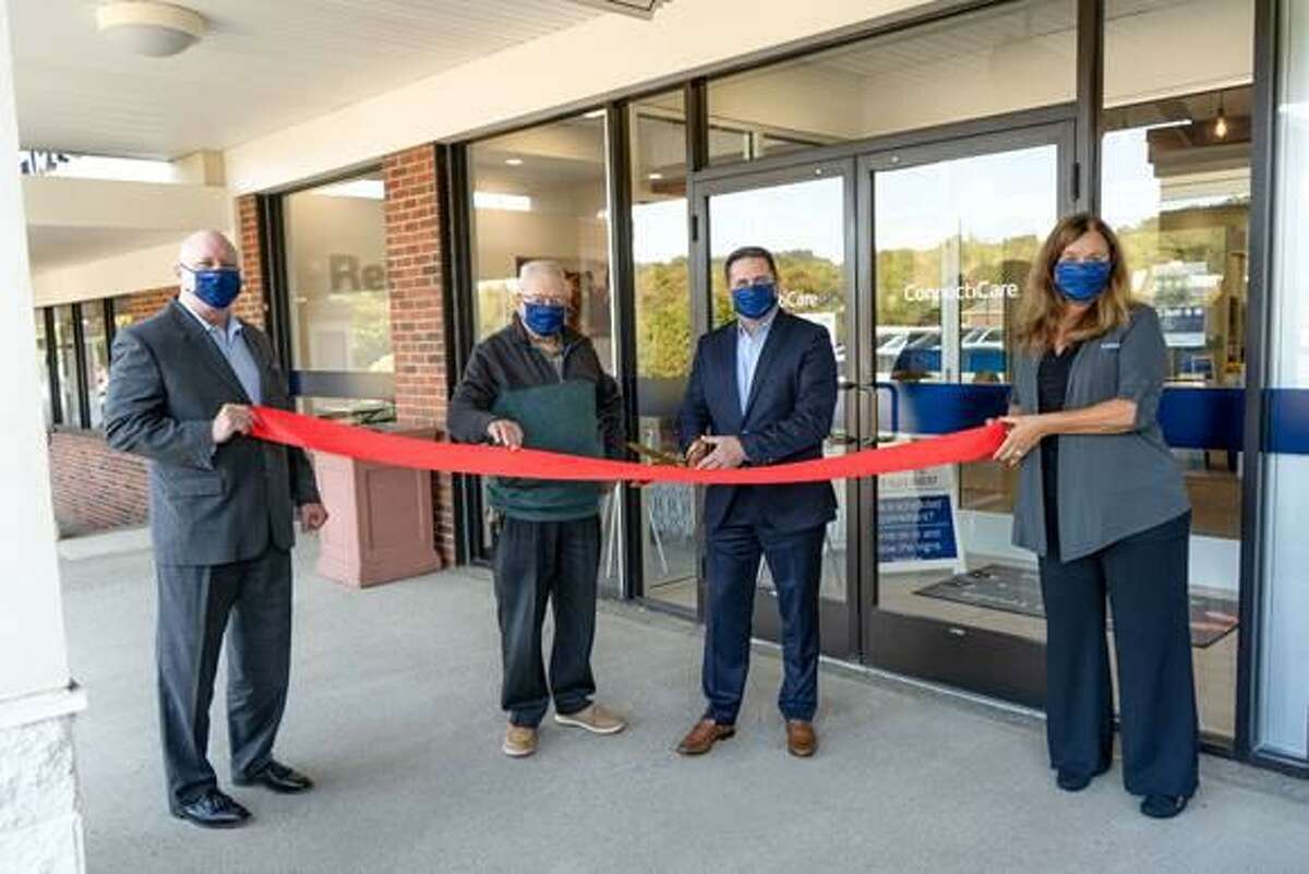 Brian Pagliaro, senior vice president and chief sales and marketing officer for ConnectiCare; John Anglace, president of the Board of Aldermen for the City of Shelton; Eric Galvin, president of ConnectiCare, and Laurie Blier, director of retail operations for ConnectiCare, celebrate the grand opening of a fifth ConnectiCare center in Shelton.