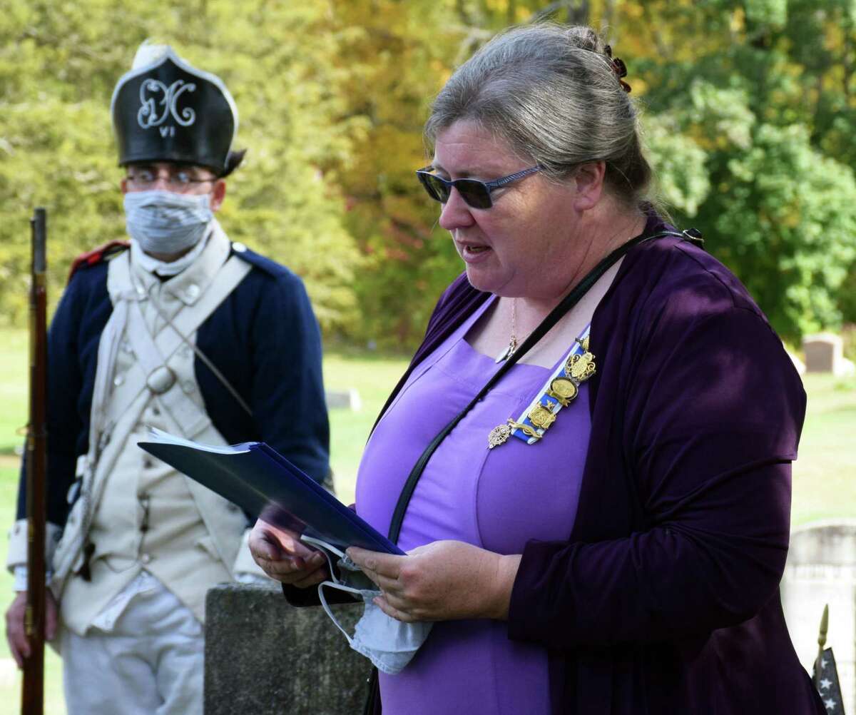 Roger Sherman Chapter, DAR chaplain Marcella Martin offers the invocation at the start of the ceremony. The ceremony at Center Cemetery honored Pvt. Samuel Phillips and Pvt. Jeruel Phillips, two African-American soldiers from New Milford.
