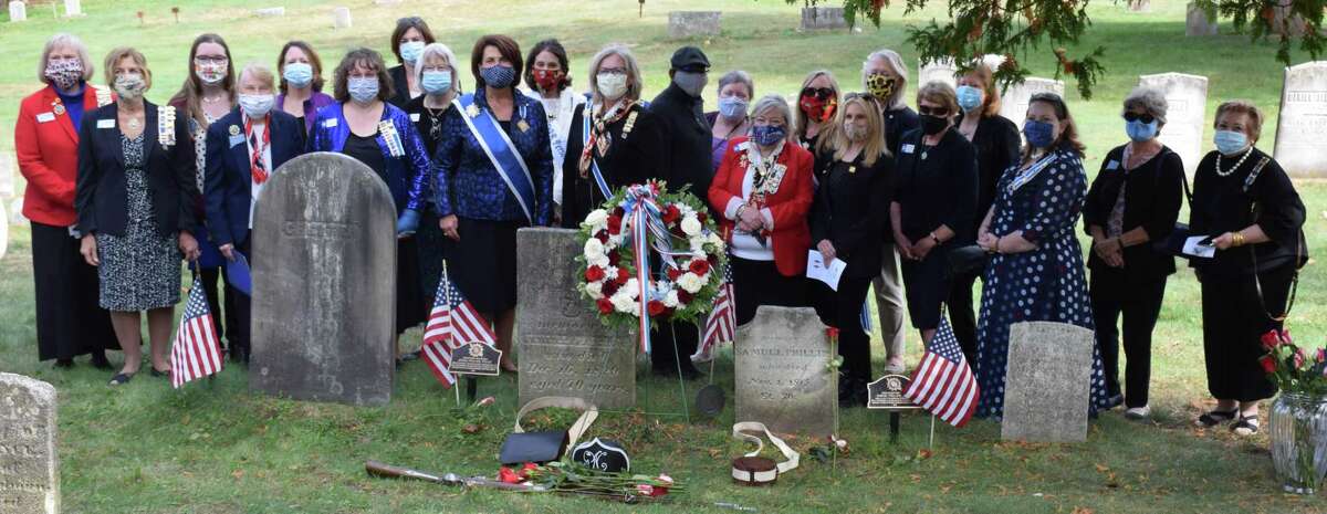 DAR representatives and William Fothergill, center, a descendant of Samuel and Jeruel Phillips, take a moment to have a photograph taken at the conclusion of the ceremony. Buckbee shared his appreciation for being part of the occasion, saying the legacy of men like Jeruel and Samuel