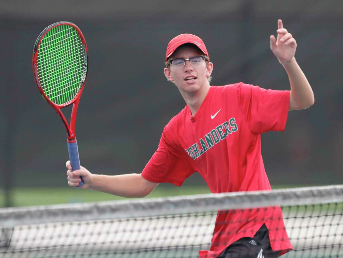 The Woodlands’ Ian Skelly warms up before a high school tennis match at Grand Oaks High School, Thursday, Sept. 24, 2020, in Spring.