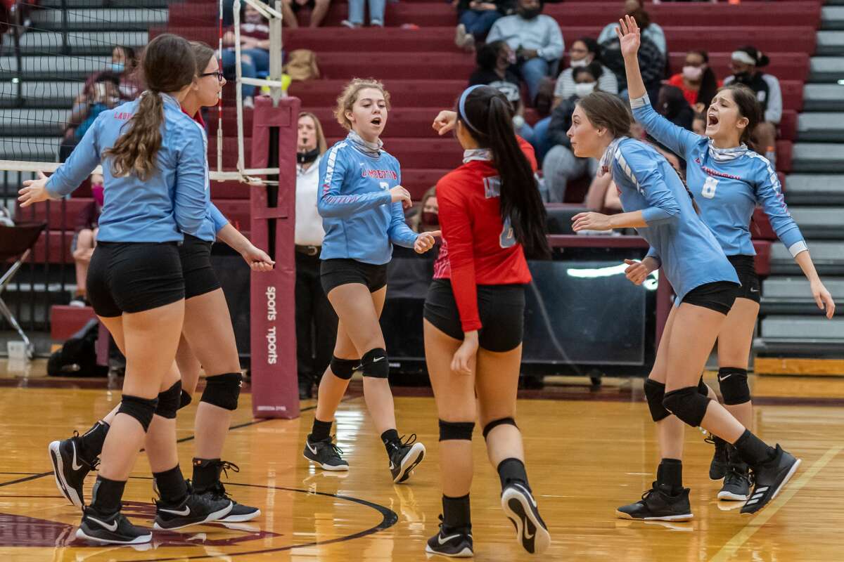 Lumberton players celebrate a point. The Lady Raiders volleyball team traveled up the road to take on the Lady Tigers of Silsbee. Photo made on October 13, 2020. Fran Ruchalski/The Enterprise