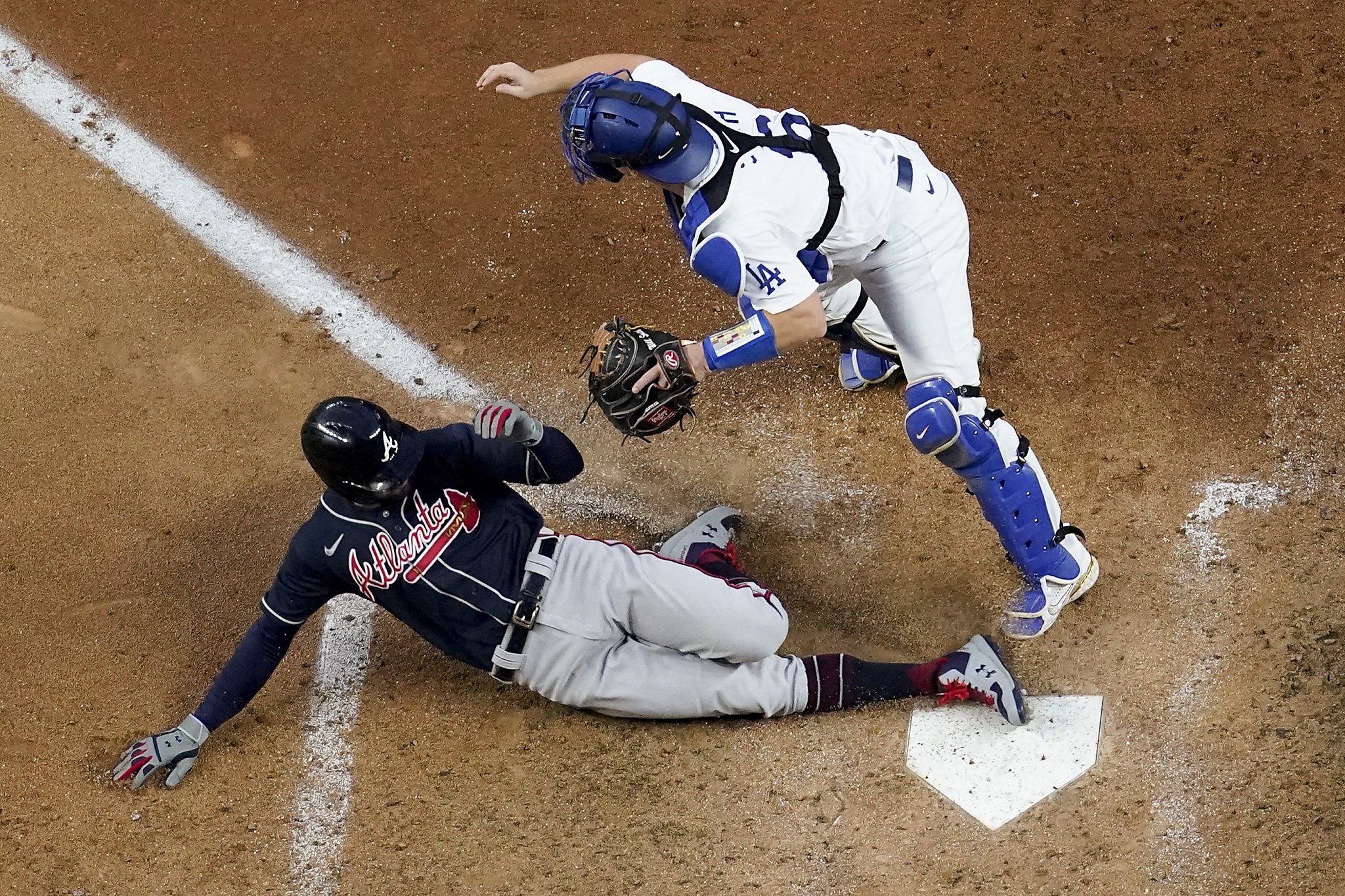 Freddie Freeman and Ozzie Albies homer as Braves hold on for victory and  2-0 series lead