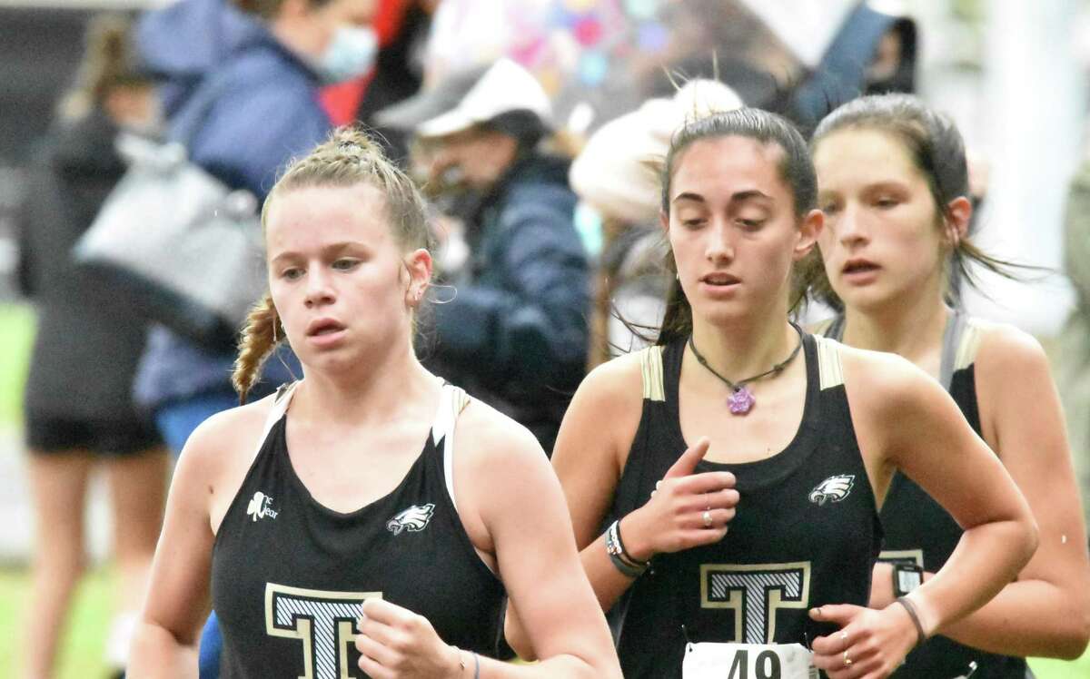 Seniors Keira Grant and Brenna Asaro helped the Eagles earn a victory in their final home meet of the regular season.