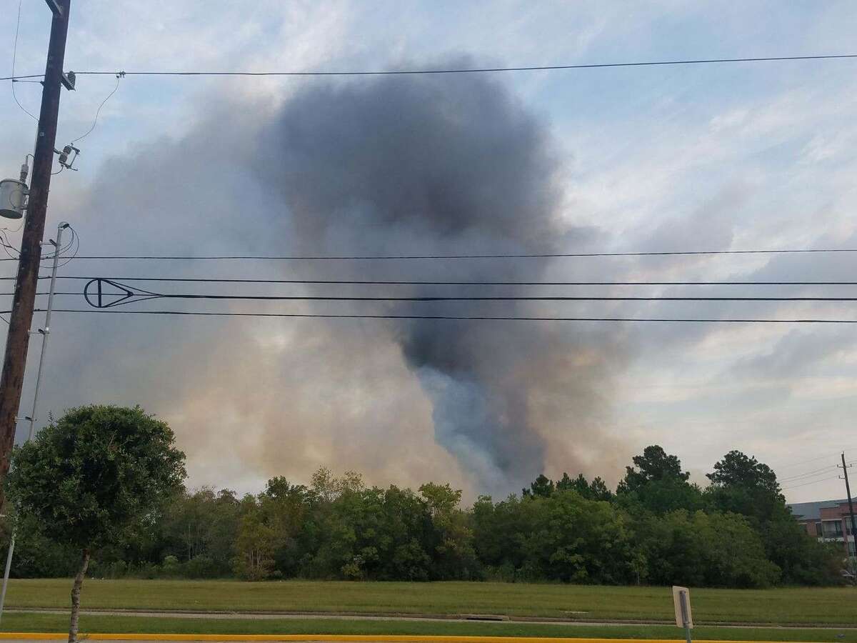 Firefighter hospitalized after massive fire erupts at Katy apartment