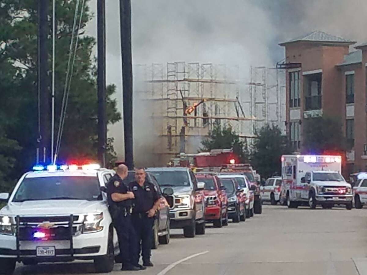 Firefighter hospitalized after massive fire erupts at Katy apartment