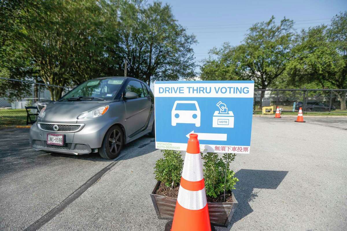 A drive-thru for voters at the Houston Food Bank, which is operating an early voting site for the first time Tuesday, Oct. 13, 2020, in Houston.