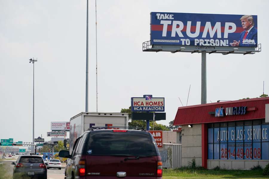 Trump billboard in Houston goes viral after being vandalized ...