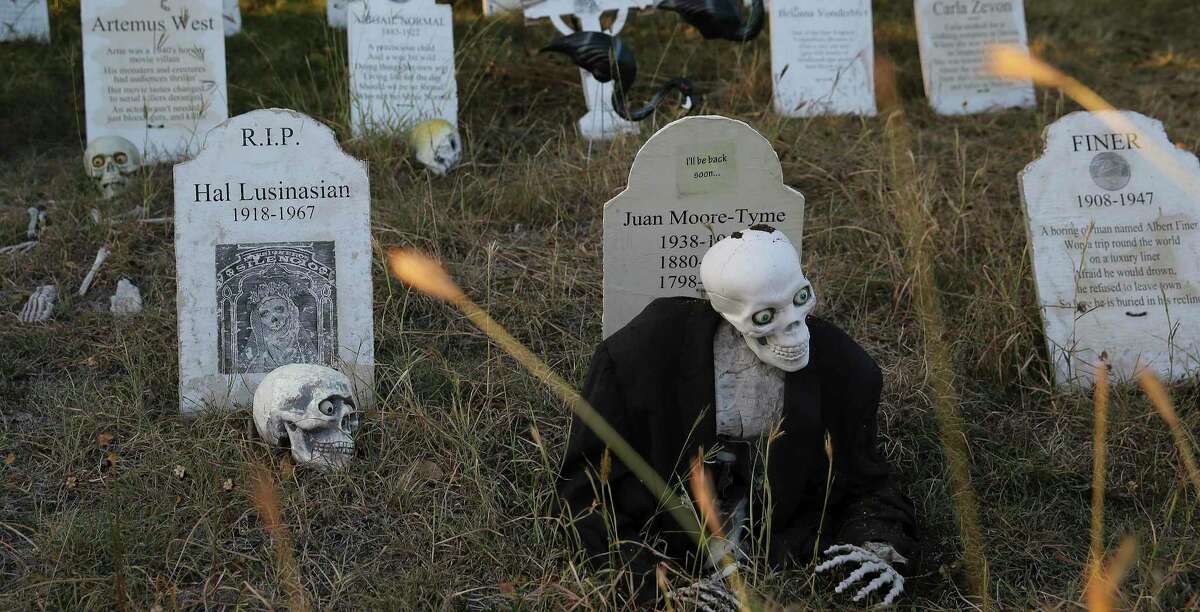 Tombstones are a big part of Michael Lane’s front yard Halloween decorations.