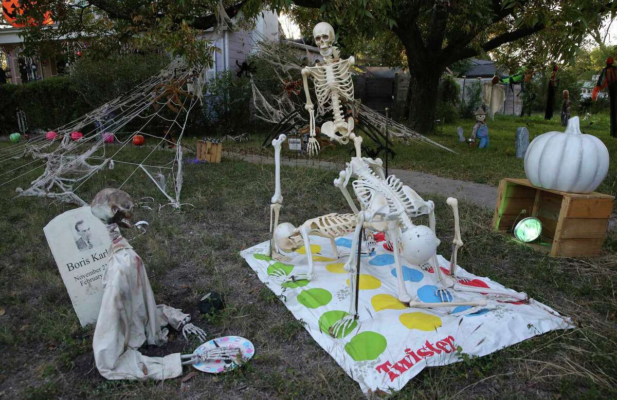 Michael Lane loves to incorporate humor into his Halloween yard decorations, such as this twisted game of Twister.