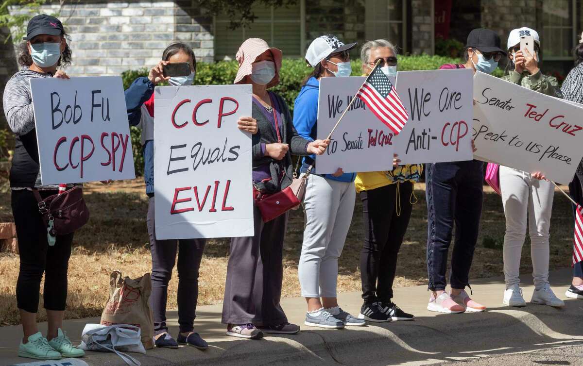 Chinese protestors continue 10/15/2020 to stand along Bishops Castle Drive, claiming Pastor Bob Fu is a communist spy. Tim Fischer/Reporter-Telegram
