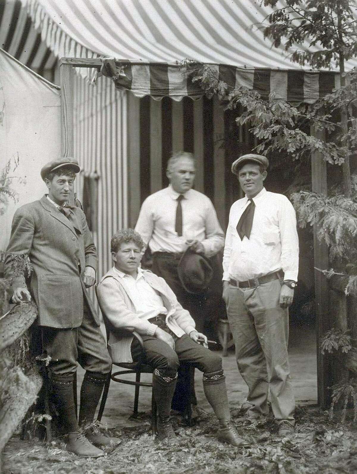 Poet George Sterling, a man of many contradictions (left), hangs out with journalist Jimmy Hopper and authors Harry Leon Wilson and Jack London at the Bohemian Grove in 1913.