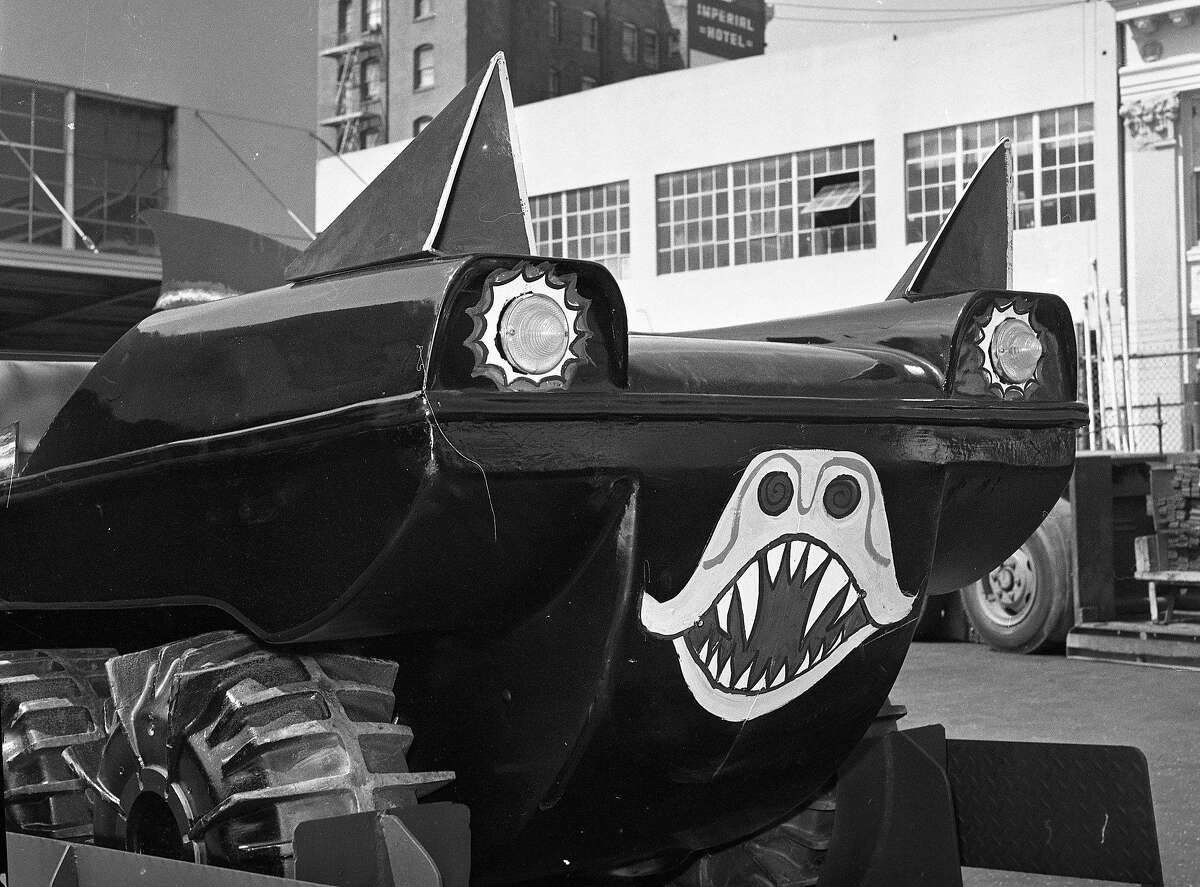Batman was the hottest TV program in the summer of 1966, and The thought a good way to prompt the introduction of a nw Batman comic strip was to give away a replica Batmobile, seen here out side the paint garage of the old News-Call building, May 20, 1966