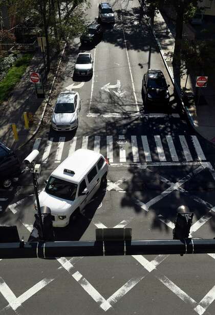 Vehicles travel on York Street in New Haven through the intersection with South Frontage Road on October 14, 2020.