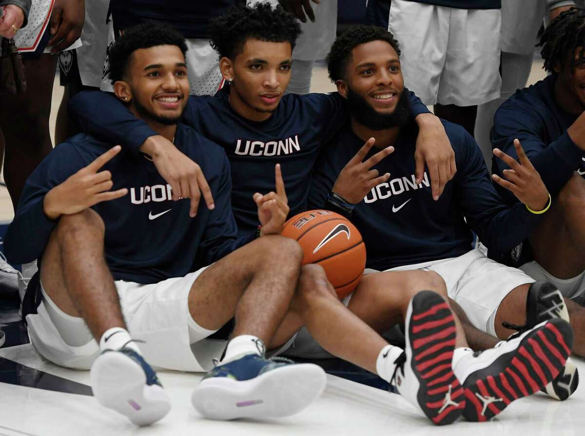 UConn’s Jalen Gaffney, left, James Bouknight, center, and R.J. Cole, right, pose for a photo during last year’s First Night celebration. Bouknight is the Huskies’ unquestioned top dog, and both Gaffney and Cole have the potential be the team’s No. 2 scorer.