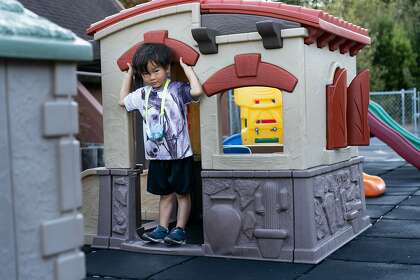 James Trinh, 5, shows how Maki the Lemur went into this house before being caught at the playground of the Hope Lutheran Playground on Friday, Oct. 16, 2020 in South San Francisco, Calif.