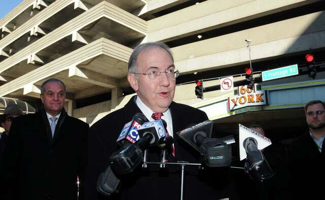In 2012, state Sen. Martin Looney spoke to the media along with legislators and advocates about support for legislation that would allow red light cameras in the state. The press conference was held on the corner of York Street and South Frontage Road, the site of a fatality in April 2008.