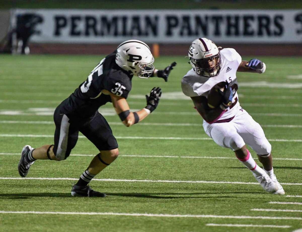 Lee's Makhilyn Young carries the ball as Permian's Jaxon Dorethy (35) pushes him out of bounds Friday, Oct. 16, 2020 at Ratliff Stadium. Jacy Lewis/Reporter-Telegram