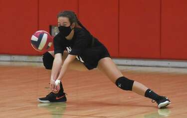 what kind of shoes do volleyball players wear