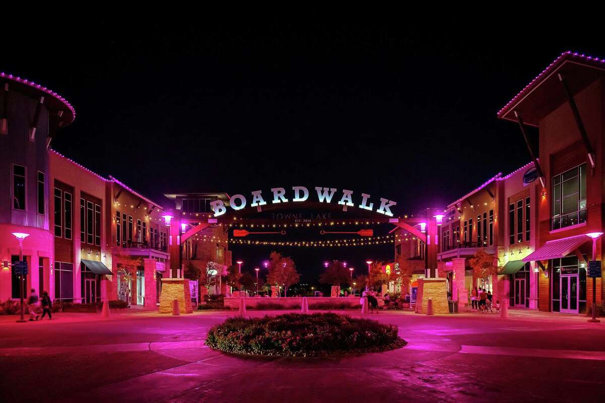 The Boardwalk at Towne Lake in northwest Houston is awash in pink with 2,000 lights recognizing Breast Cancer Awareness month this October. Every night of the month, from the rooftops to the green space area and bistro lights strung across the green, the lighting display sponsored by Houston Methodist shines a light on prevention, detection, and treatment.