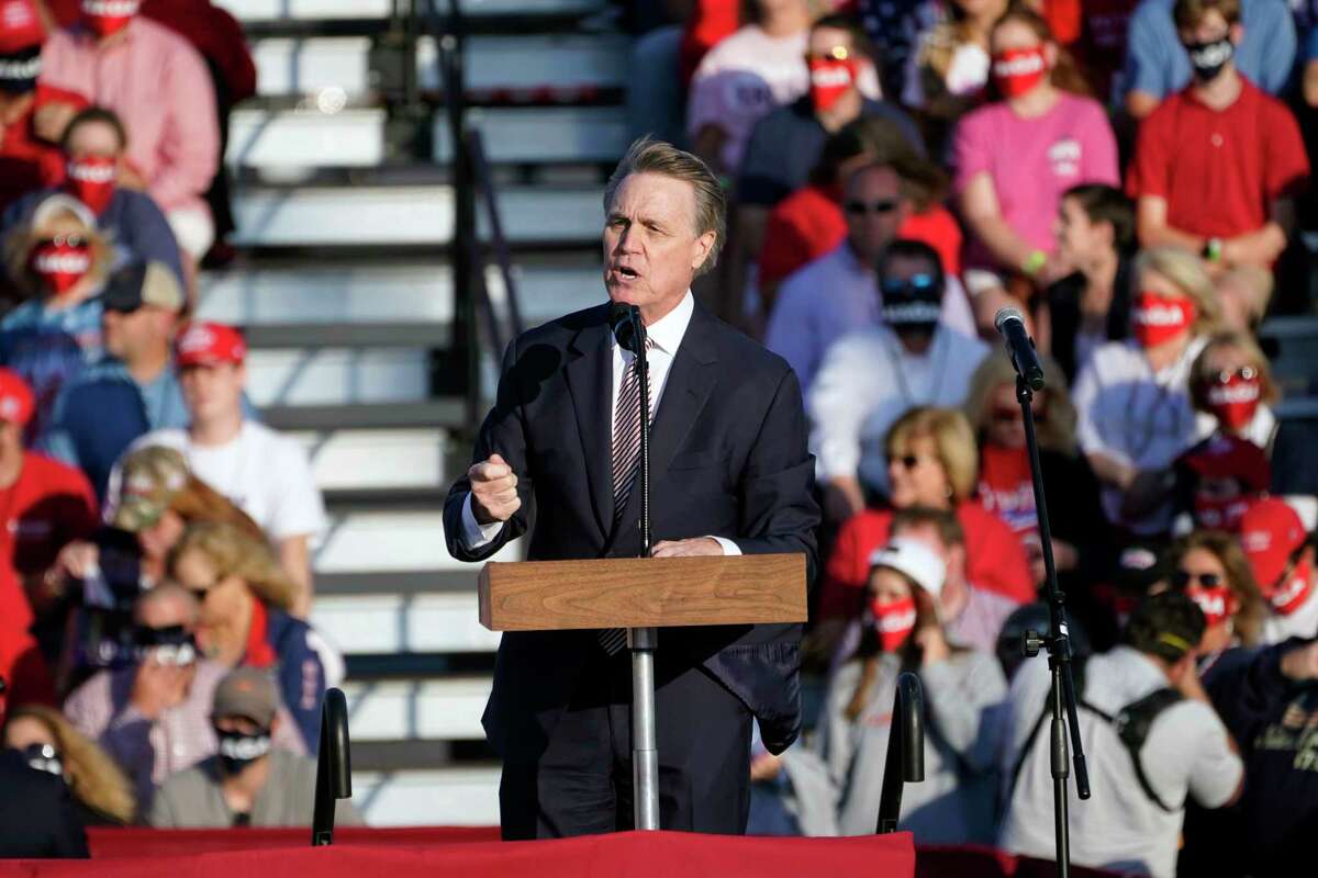 Sen. David Perdue, R-Ga., speaks during a campaign rally for President Donald Trump at Middle Georgia Regional Airport, Friday, Oct. 16, 2020, in Macon, Ga.