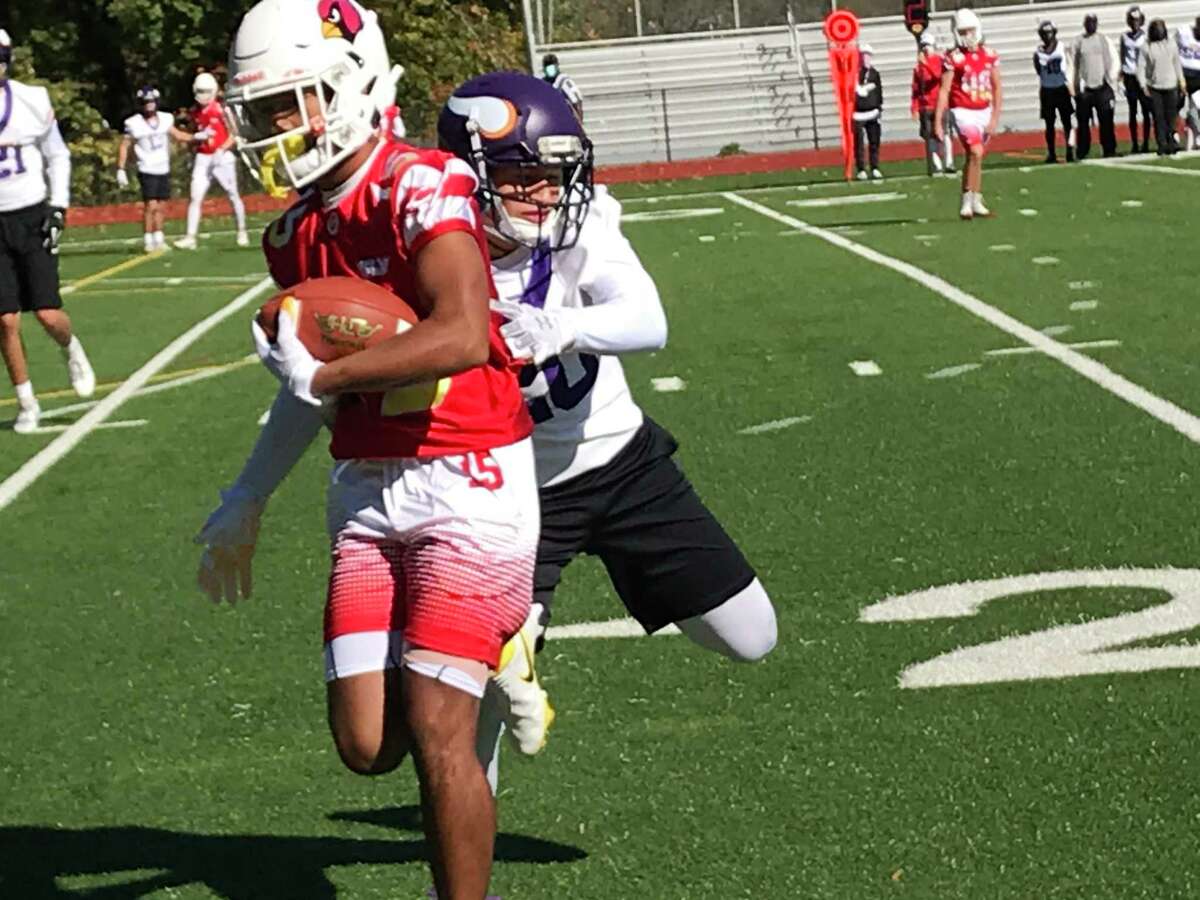Greenwich senior A.J. Barber looks to gain yards after making a reception in the Cardinals’ 7-on-7 football game against Westhill on Saturday, October 17, 2020 in Greenwich, Connecticut.