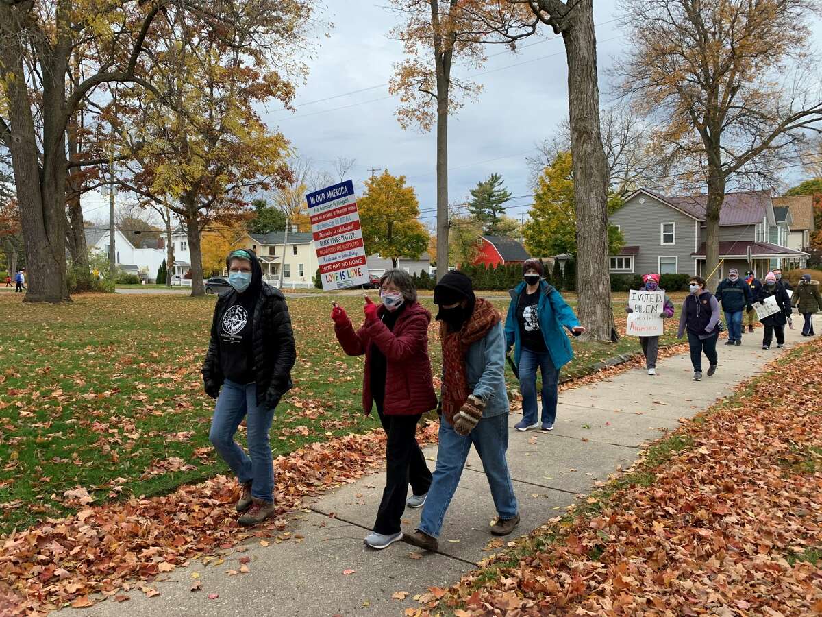 Women, men, and even some children gathered at Mitchell Creek Park on Saturday for the Women's March Big Rapids. The march was coordinated to occur at the same time as hundreds of women's marches across the country in honor of Justice Ruth Bader Ginsburg.