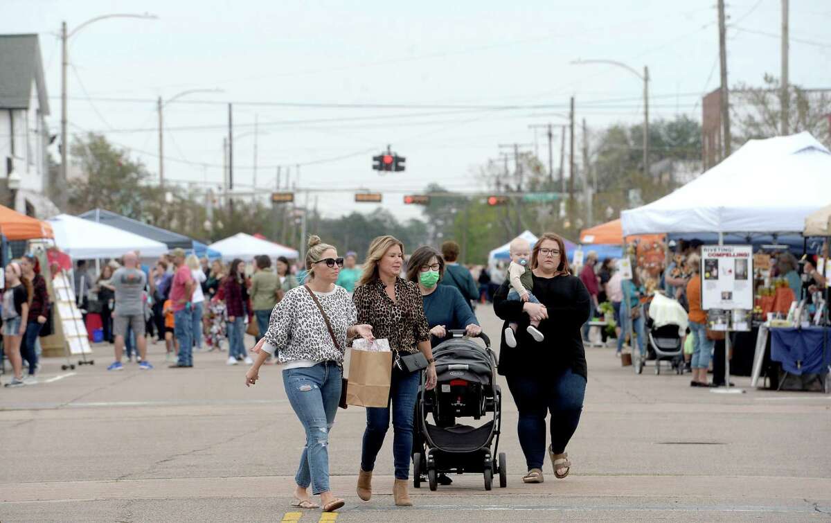 Shoppers fill Boston Avenue, perusing the vendor booths and open shops, during Nederland's Fall Fest Saturday. Photo taken Saturday, October 17, 2020 Kim Brent/The Enterprise