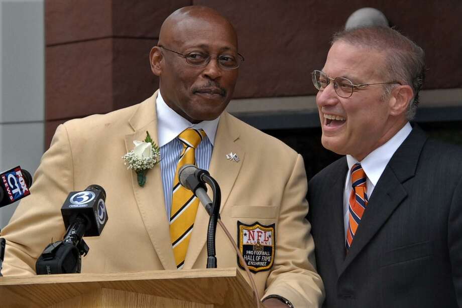 Floyd Little, left and Bill Santillo at the 2011 dedication of the Floyd Little Athletic Center in New Haven. Photo: Contributed / Bill O'Brien