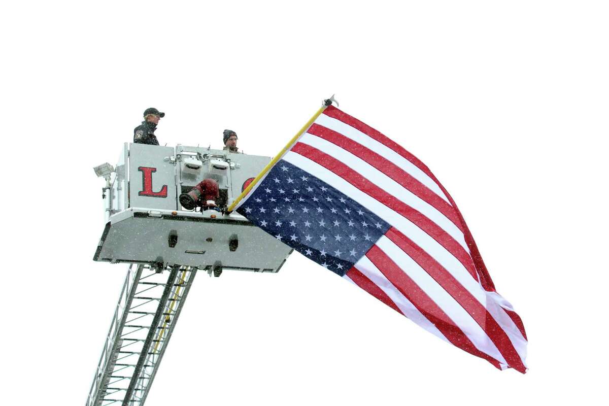 The American flag was displayed high and proud in downtown Big Rapids for last year's Veterans Day parade. This year's installment was cancelled due to coronavirus concerns. (Pioneer file photo)