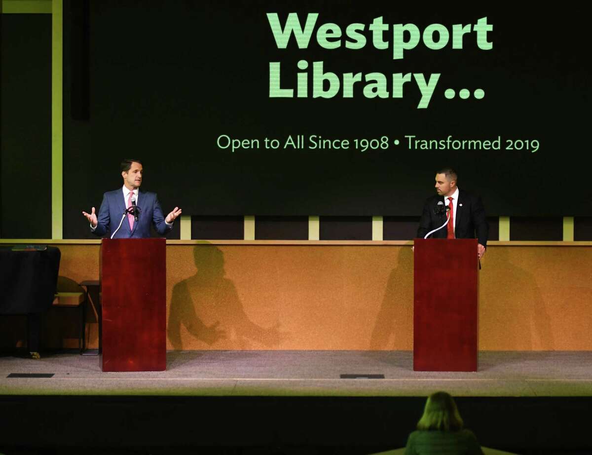 U.S. Rep. Jim Himes, D-Conn., left, and Republican challenger Jonathan Riddle speak during the 4th District debate at the Westport Library’s Trefz Forum on Sunday.
