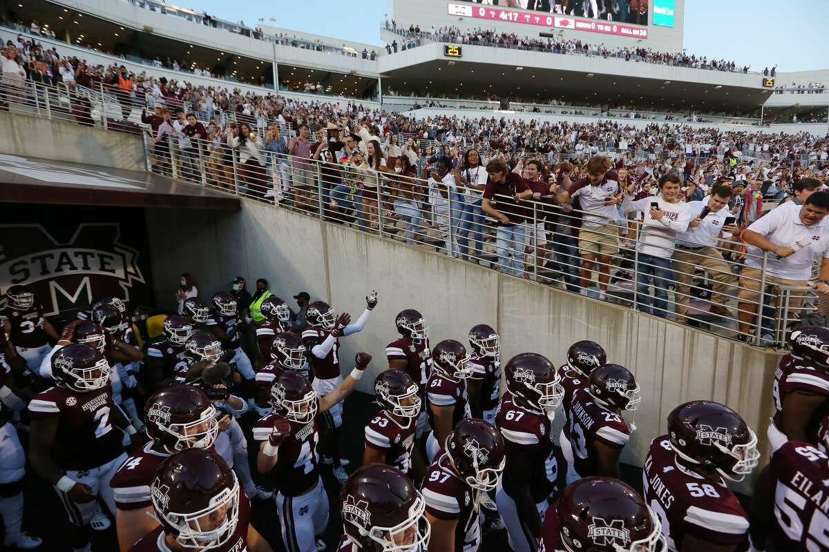 Fans in the student section cheer as the Mississippi State Bulldogs take the field prior to a game against the Arkansas Razorbacks at Davis Wade Stadium on Oct. 03, 2020, in Starkville, Miss.