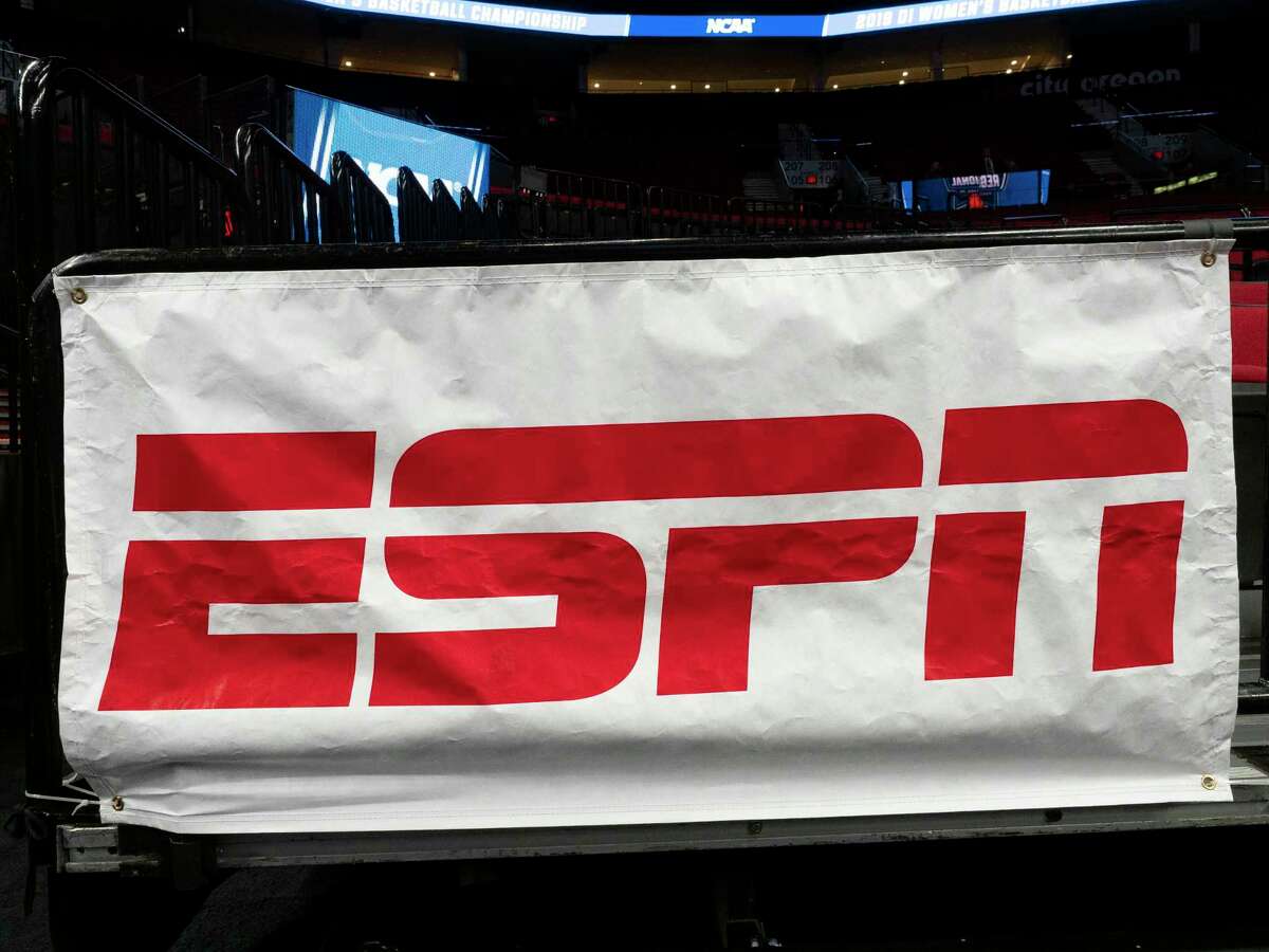 ESPN announced Thursday it will lay off 300 employees as a result of the COVID-19 pandemic on its business.
