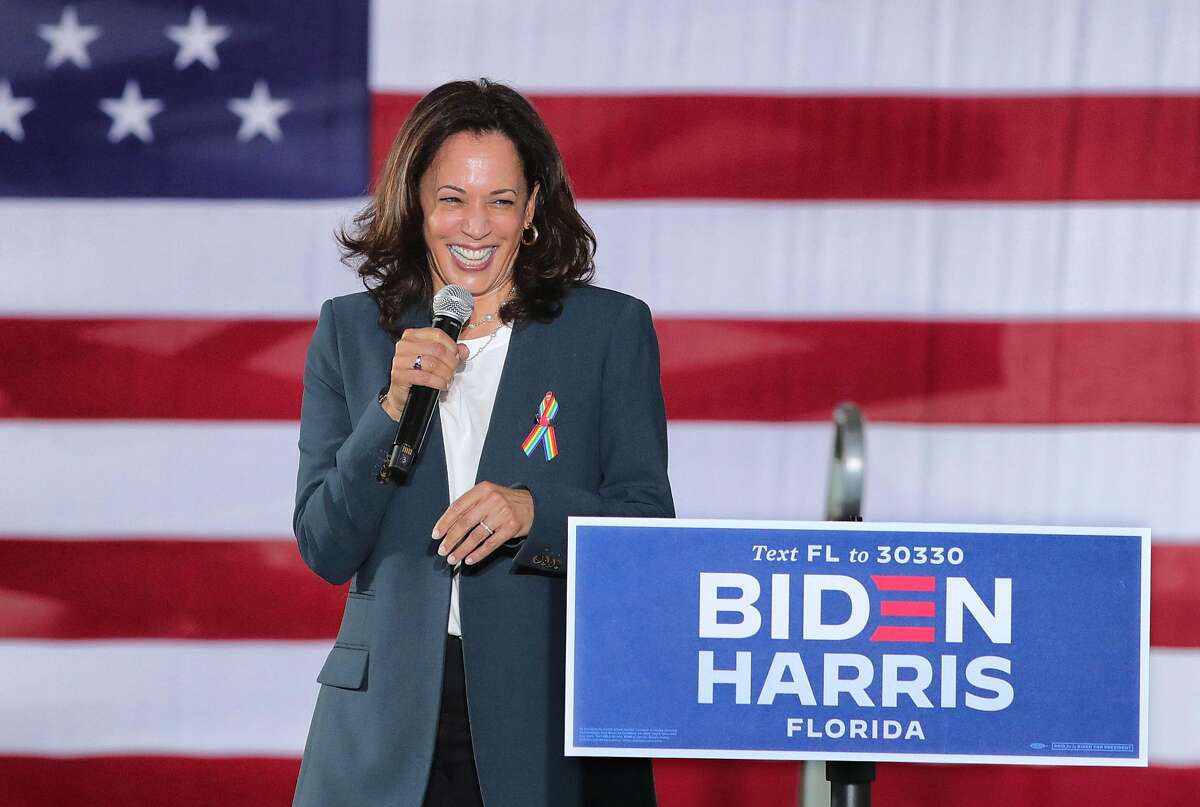 Democratic vice presidential nominee Sen. Kamala Harris responds to cheering supporters as she takes the stage for an early-voting event at the Central Florida Fairgrounds, Monday, October 19, 2020. (Joe Burbank/Orlando Sentinel/TNS)