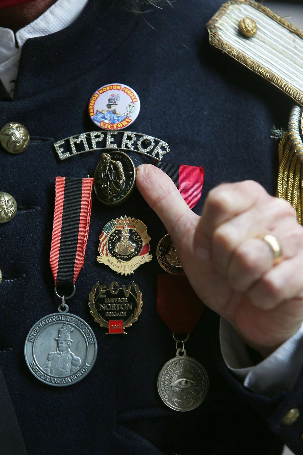 Joseph Amster as Emperor Norton wears a pin that says Emperor along with medals on his jacket on Wednesday, September 30, 2020 in San Francisco, Calif.
