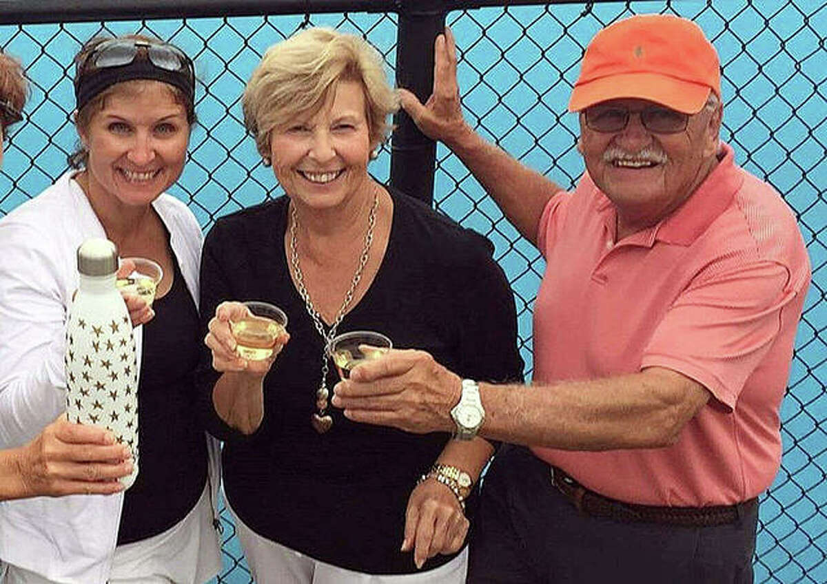 Edwardsville graduate Lori (Zupanci) Saguto celebrates with her parents, Gloria and Jim, after winning her singles match at the USTA Illinois State Championships in Champaign at the University of Illinois in 2017. Saguto’s team also won and advanced to the Midwest Championships in Indianapolis.