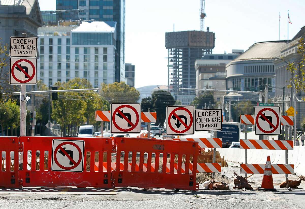 Left turns are prohibited onto Golden Gate Avenue while construction on the bus rapid transit project continues on Van Ness Avenue in San Francisco, Calif. on Wednesday, Oct. 14, 2020. The Van Ness Improvement Project is behind schedule but the SFMTA says when completed it will vastly improve public transportation and traffic through the busy corridor.