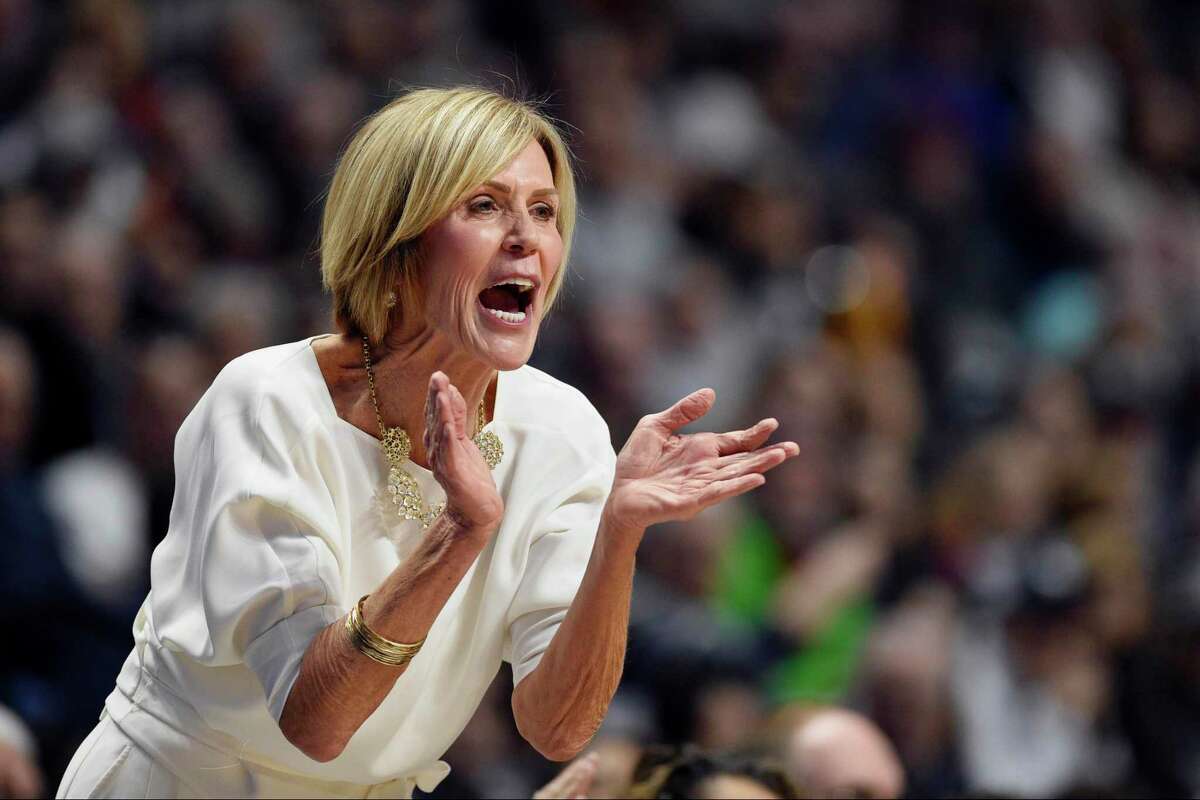 UConn associate head coach Chris Dailey calls to her team during a 2019 game against Oklahoma. Dailey took the reins as Geno Auriemma was out following surgery. The Huskies won 97-53.