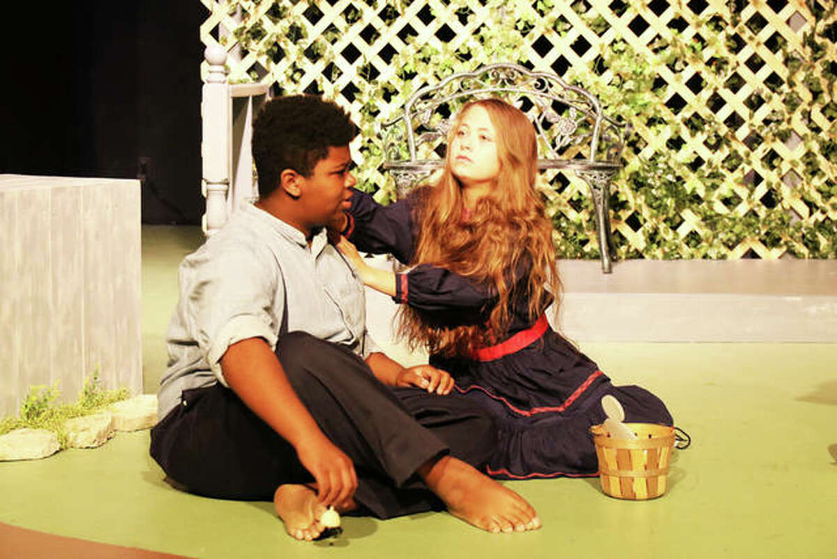 Percy (Marvin Short) and Helen (Kya Wonders) converse in the Alton Little Theater production of “The Miracle Worker.”