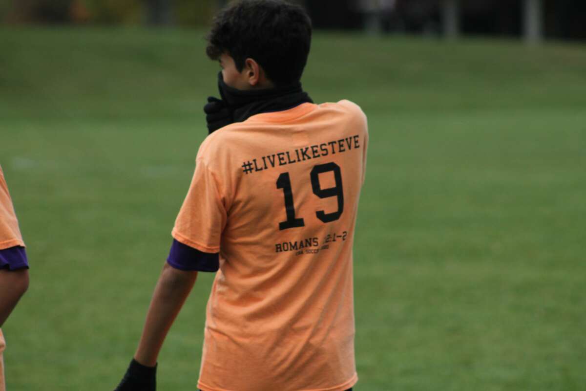 Calvary Baptist's soccer team wore warmup shirts honoring fallen teammate Stephen Kipfmiller during Tuesday's district semifinal.