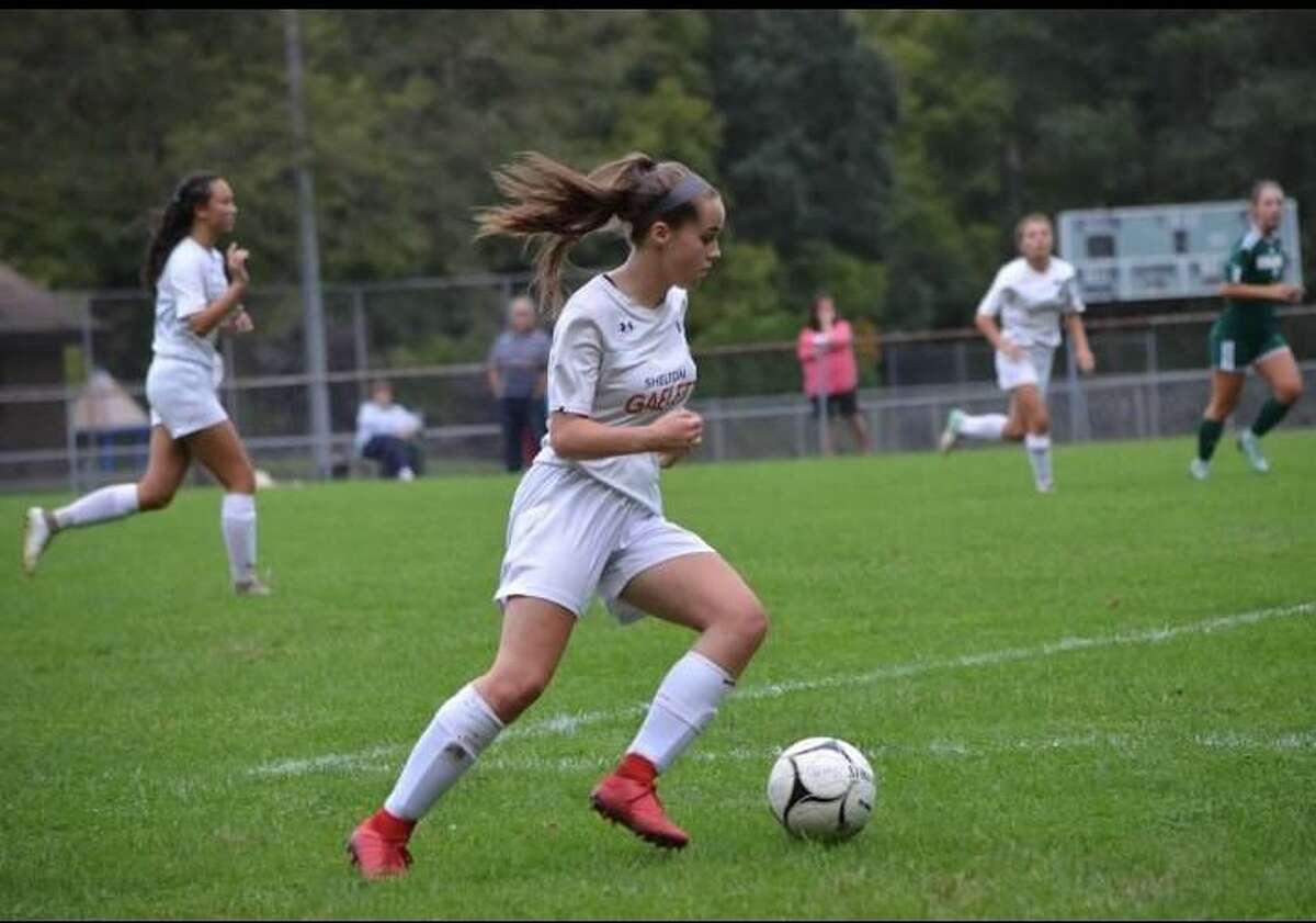 Noelle Garretson and her 8 senior classmates have helped Shelton start the season 3-1-1.