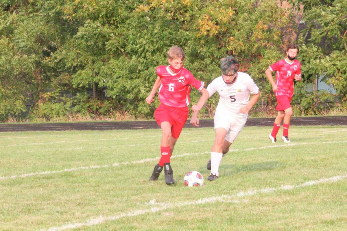 Reed City's Justin Stellini (6) goes after the ball during action this season. (Pioneer photo/John Raffel)