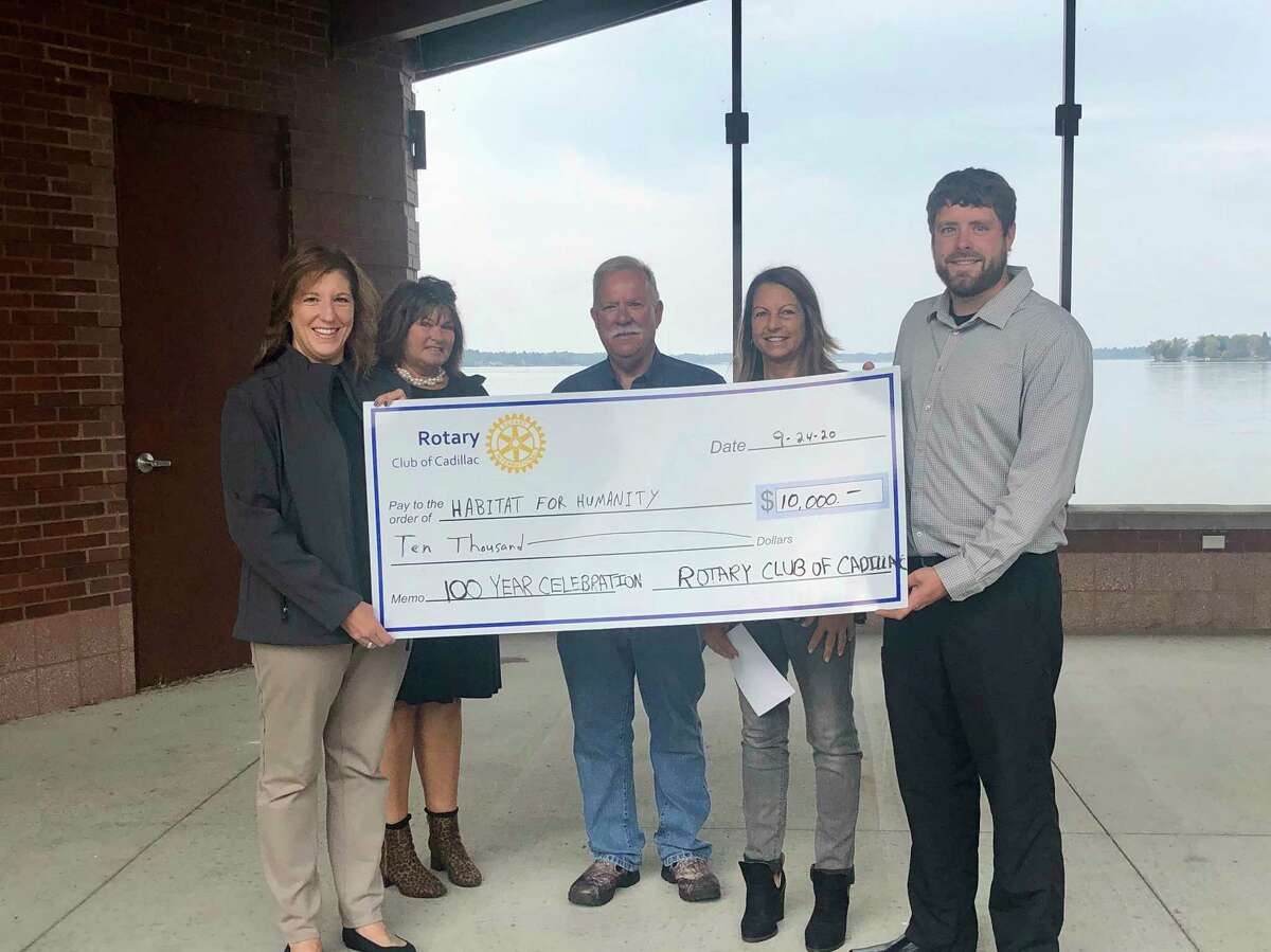 The Rotary Club of Cadillac presented the Wexford Osceola Habitat for Humanity with a donation of $10,000 in honor of their 100th year. (Submitted photo)