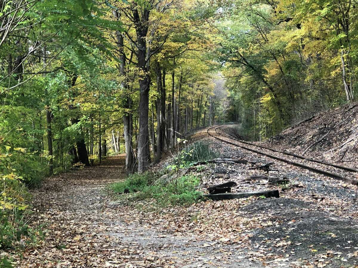 The autumn foliage creates a picturesque scene along the railroad tracks and the path for Sega Meadows in New Milford on a recent afternoon. It's hard not to think of poet Robert Frost's words: "Two roads diverged in a wood and I - I took the one less traveled by, and that has made all the difference."