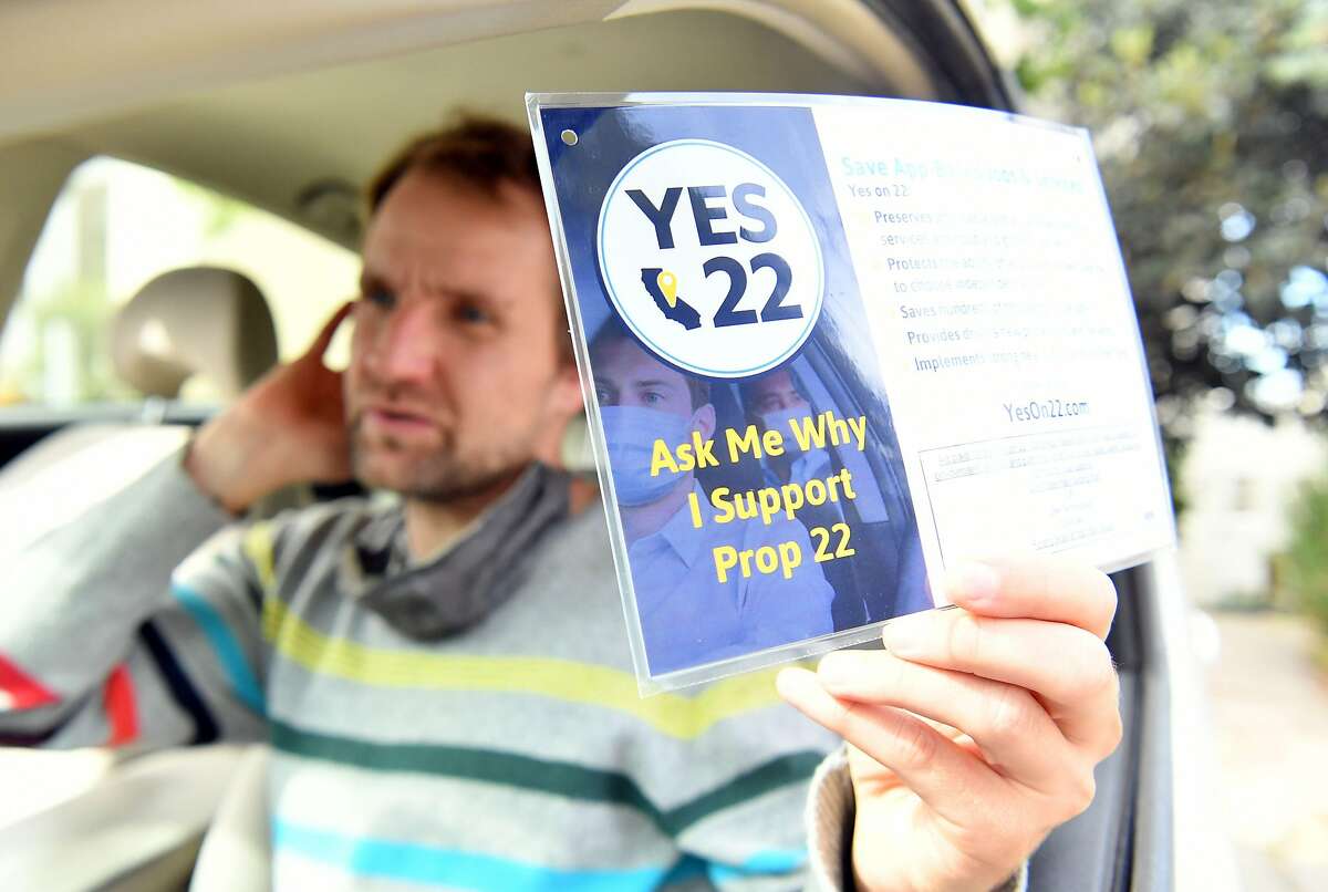 FILE: Uber driver Sergei Fyodorov discusses why he supports a yes vote on Proposition 22 in Oakland, Calif., on Oct. 9, 2020.