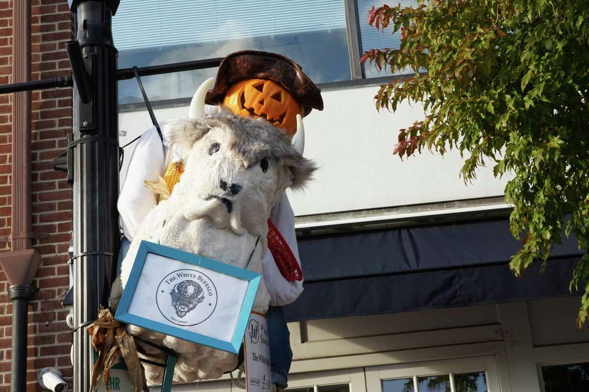 Nearly 100 scarecrows are hung on lamp posts around the village of New Canaan for the fourth annual Scarecrow Fest, presented by the Young Women’s League of New Canaan. The Project Coordinator for the town, Mimi Pitt, provides information in this guest column about how residents can observe the holiday during the coronavirus pandemic.