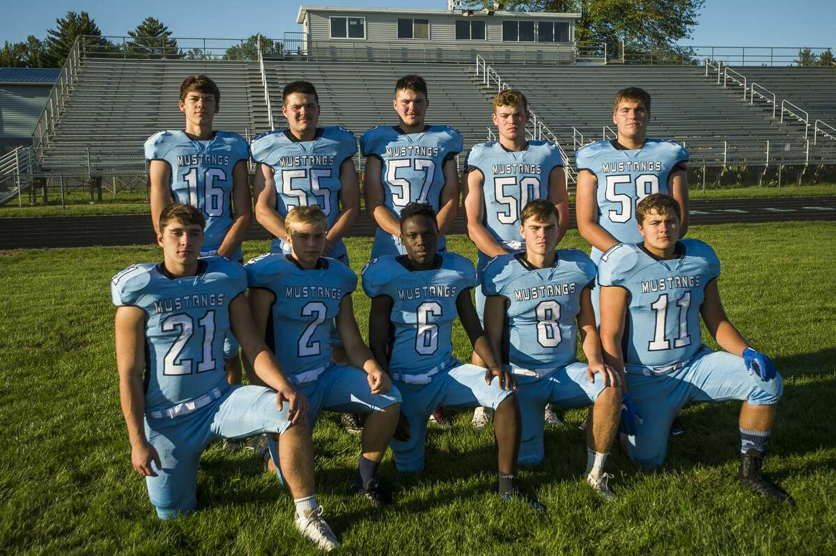 Senior members of Meridian's football team (front, from left) Jake Schultz, Jack Murphy, Gabe Mutai, Cam Metzger, Josh Barriger, and (back, from left) Josh Nohel, Riley Trudell, Ben Trudell, Tristan Martin, and Gabe Sturgeon pose for a preseason picture.