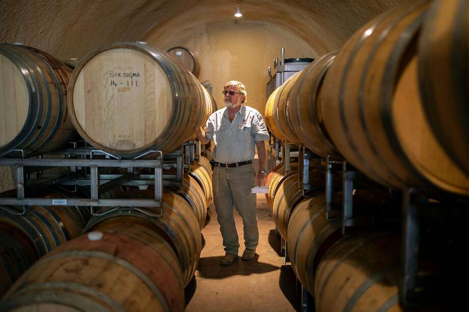 Kaj Ahlmann stands among barrels of wine at Six Sigma Ranch and Winery in Lower Lake (Lake County). Photo: Santiago Mejia / The Chronicle
