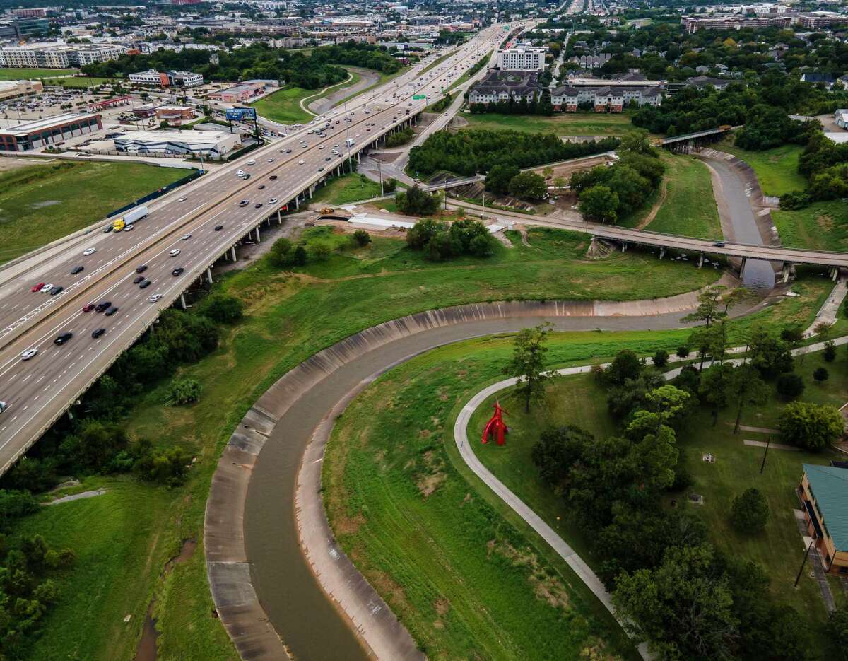 Interstate 10 runs along White Oak Bayou near Stude Park, seen on Sept. 24, 2020, in Houston. Officials plan to build managed lanes along the freeway, to accommodate faster transit and carpool trips.