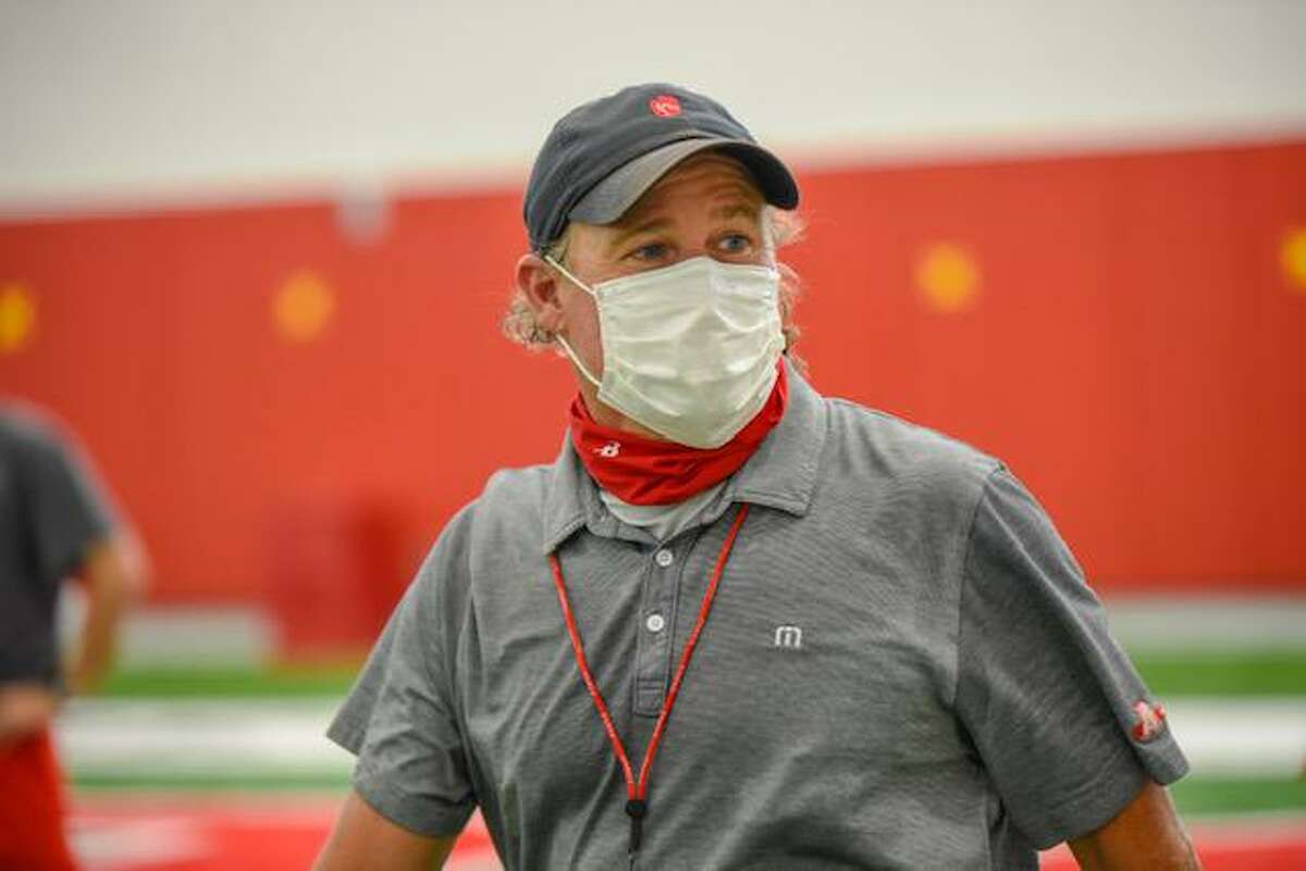 UH football coach Dana Holgorsen, at a recent workout with a mask donated by Ascend Performance Materials.