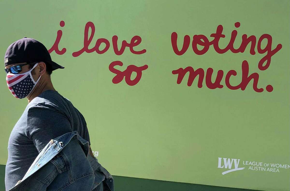A popular mural outside Jo's Coffee in a trendy section of Austin, Texas, has been repainted for the election.
